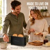 image:imageNostalgia Slim 2Slice Toaster  Wide Slot  SpaceSaving Design  Adjustable Browning Dial  10inch Long Slot Fits 2 Slices of Bread or Bagel Halves  Dropdown Crumb Tray  BlackberryBlack