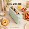 image:imageNostalgia Slim 2Slice Toaster  Wide Slot  SpaceSaving Design  Adjustable Browning Dial  10inch Long Slot Fits 2 Slices of Bread or Bagel Halves  Dropdown Crumb Tray  BlackberrySage