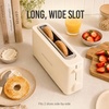 image:imageNostalgia Slim 2Slice Toaster  Wide Slot  SpaceSaving Design  Adjustable Browning Dial  10inch Long Slot Fits 2 Slices of Bread or Bagel Halves  Dropdown Crumb Tray  BlackberryOatmeal